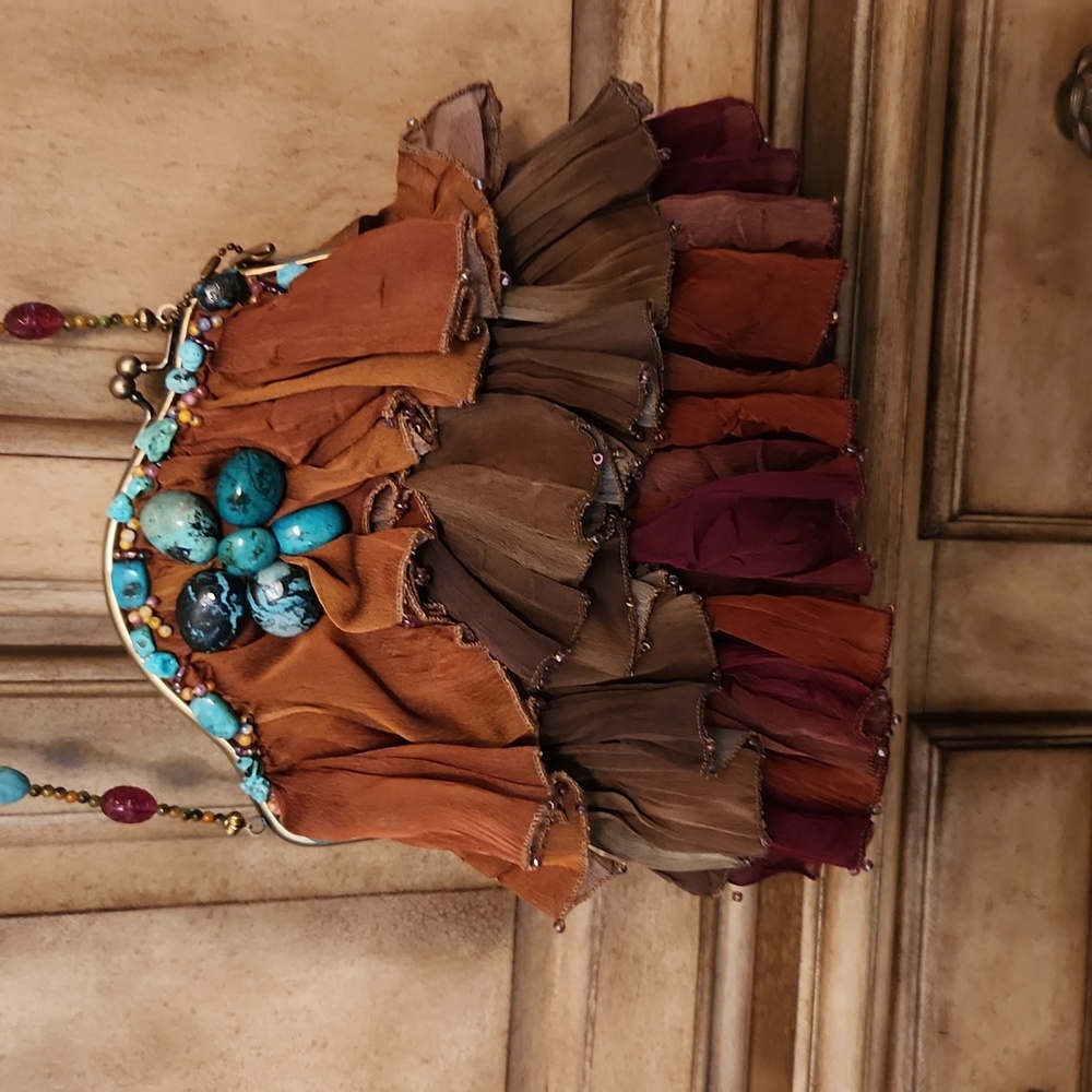 Mary Frances accessorized purse.